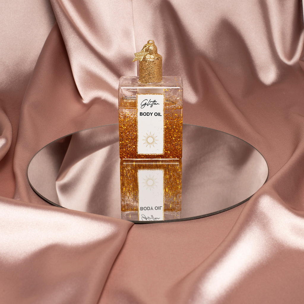 Vondels kerstbal body oil met glitters