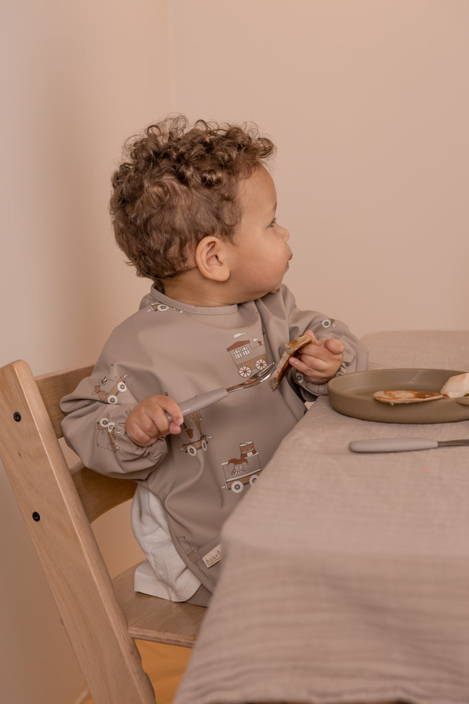 nuuroo slab waterproof met mouw Cream carnival train